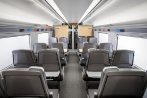 Hitachi IEP train interior with LED luminaires in the ceiling